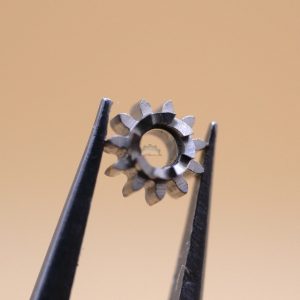 N°410 Pignon de remontoir - Record 25 [NOS] Winding pinion