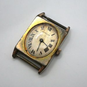 Montre mécanique CORIOLAN - Boitier doré rectangle - Ne fonctionne pas