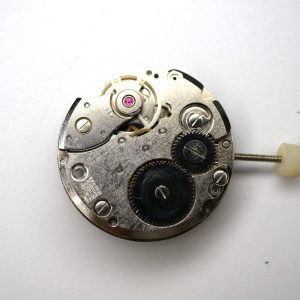 Mouvement pour pièces ES 55 Balancier OK Fonctionne (watch movement for parts)