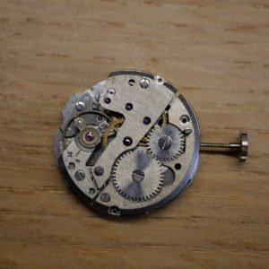 Mouvement pour pièces FE 233-67 Balance OK Fonctionne (watch movement for parts)