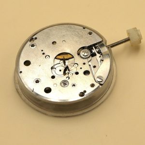 Mouvement pour pièces ES 55 Balancier OK Fonctionne (watch movement for parts)